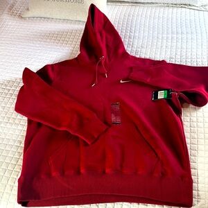 Nike men’s hoodie. New with tags!  Maroon color